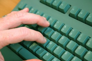 fingers on keyboard clicking